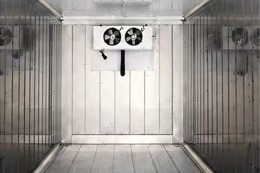 Stainless steel freezer container interior with evaporator unit